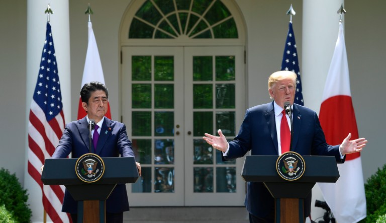 President Trump and Japanese Prime Minister Shinzo Abe speak during a news conference in the Rose Garden of the White House. 