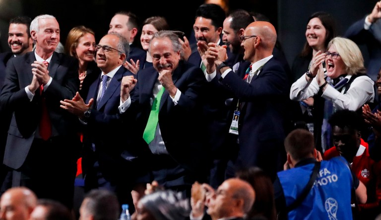 Delegates of Canada, Mexico and the United States celebrate after winning a joint bid to host the 2026 World Cup at the FIFA congress in Moscow, Russia. 