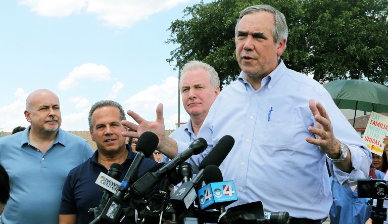Sen. Jeff Merkley, D-Ore., speaks to the media along with Sen. Chris Van Hollen, D-Md., Reps. David Cicilline, D-R.I., and Mark Pocan, D-Wis., in front of the U.S. Customs and Border Protection's Rio Grande Valley Sector's Centralized Processing Center in McAllen, Texas. 