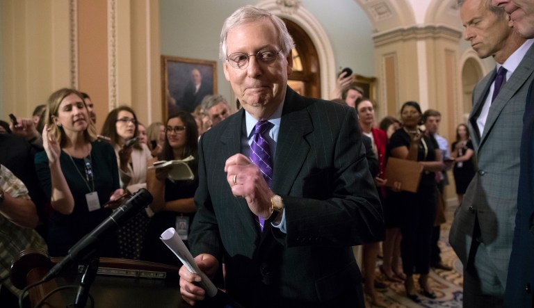Senate Majority Leader Mitch McConnell, R-Ky., with GOP leaders, finishes a news conference on Capitol Hill on June 19, 2018.
