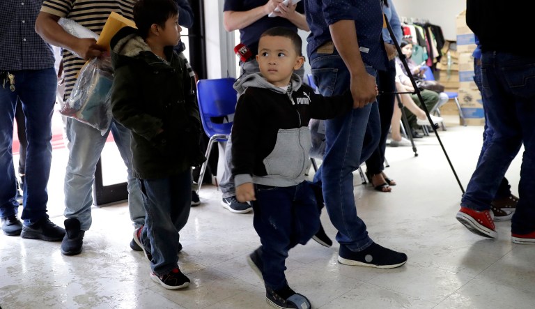 Young immigrants and arrive with their parents at the Catholic Charities RGV after they were processed and released by U.S. Customs and Border Protection, Tuesday, June 19, 2018, in McAllen, Texas.