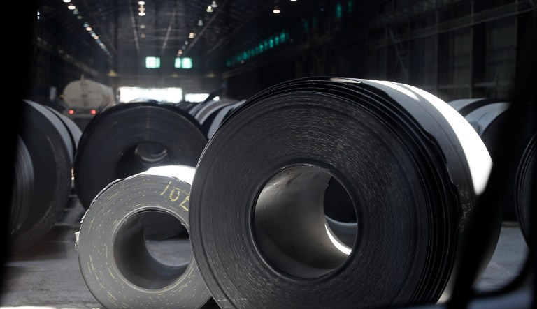 FILE- In this June 28, 2018, file photo, rolls of finished steel are seen at the U.S. Steel Granite City Works facility in Granite City, Ill. Canada began imposing tariffs Sunday, July 1, on $12.6 billion in U.S. goods as retaliation for the Trump administration's new taxes on steel and aluminum imported to the United States. Some U.S. products, mostly steel and iron, face 25 percent tariffs, the same penalty the United States slapped on imported steel at the end of May.