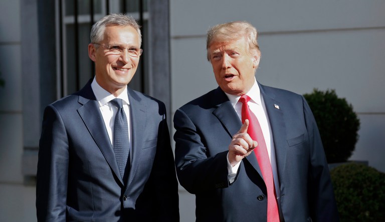 President Trump gestures during a press conference prior to his bilateral breakfast with NATO Secretary General Jens Stoltenberg in Brussels, Belgium. 