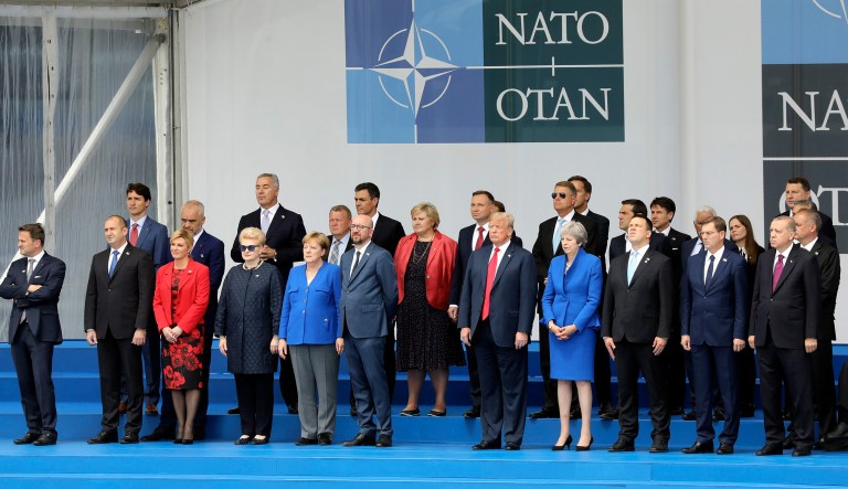 NATO heads of state pose for a family picture during the opening ceremony of the NATO summit in Brussels. 