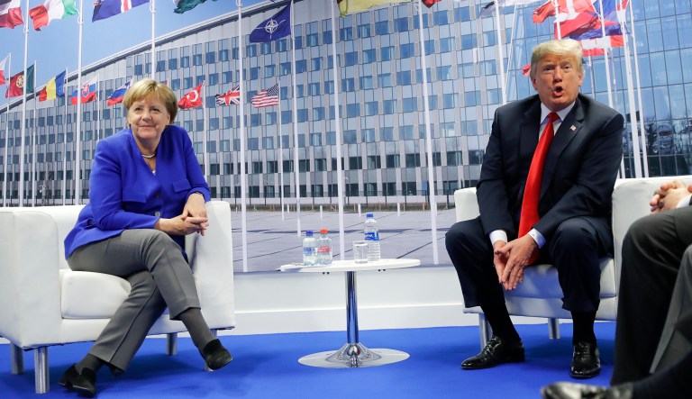 President Trump and German Chancellor Angela Merkel speak during their bilateral meeting in Brussels. 