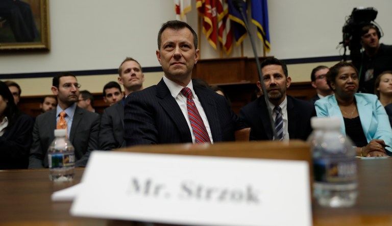 FBI agent Peter Strzok is seated before the House Judiciary and Oversight Committees. 