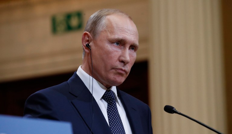 Russian President Vladimir Putin during their joint news conference with President Trump at the Presidential Palace in Helsinki. 
