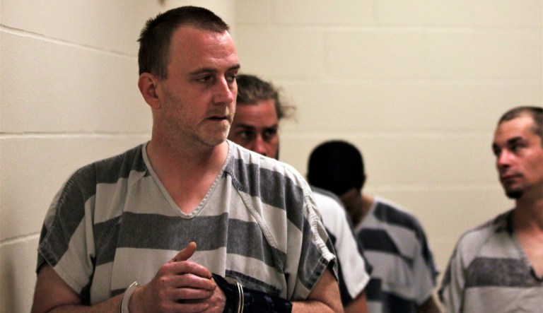 Mark Einerwold walks to his initial appearance at Minnehaha County Court on July 18, 2018, in Sioux Falls, S.D.