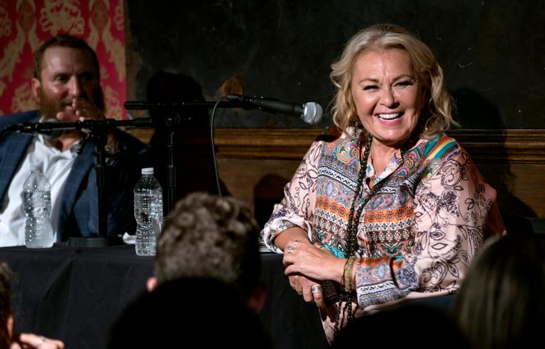 Roseanne Barr takes part in a special event and podcast taping with Rabbi Shmuley Boteach, left.