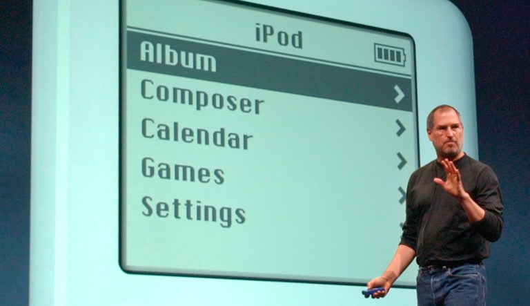 In this April 28, 2003, file photo, Apple Computer Inc. chief executive Steve Jobs gestures as he introduces the new iPod during Apple's launch of their new online 