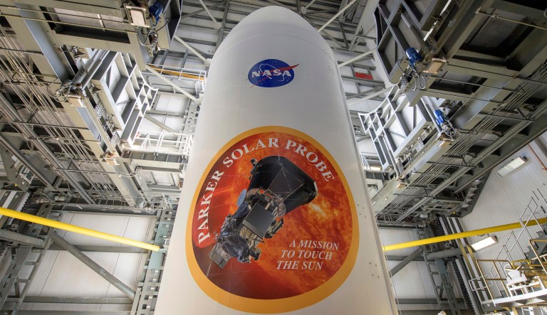 The United Launch Alliance Delta IV Heavy rocket payload fairing is seen with the NASA and Parker Solar Probe emblems, Wednesday at Cape Canaveral Air Force Station, Fla. Parker Solar Probe will travel through the sun's atmosphere, closer to the surface than any other spacecraft before it. 