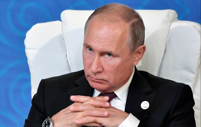 Russian President Vladimir Putin, attends a meeting in Aktau, the Caspian Sea port in Kazakhstan. 