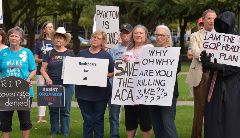 Supporters of the Affordable Care Act protest during a rally at Burnett Park in Fort Worth, Texas, Sept. 5, 2018.