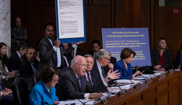Sens. Patrick Leahy, D-Vt., flanked by Dianne Feinstein, D-Calif., Dick Durbin, D-Ill., Sheldon Whitehouse, D-R.I., and Amy Klobuchar, D-Minn., questions Supreme Court nominee Brett Kavanaugh. 