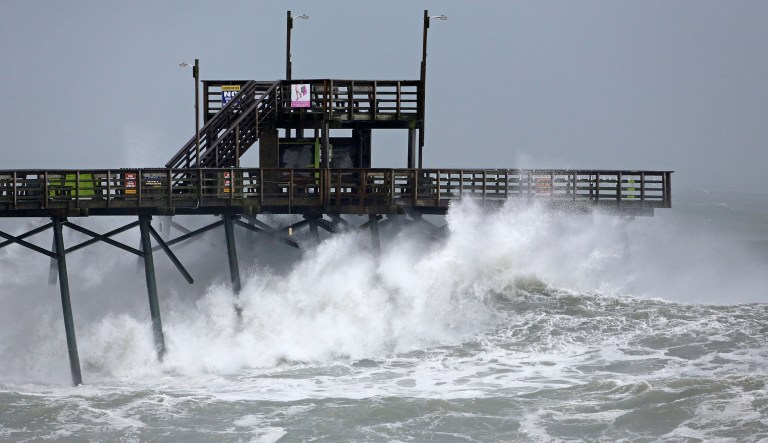 Waves from Hurricane Florence pound the Bogue Inlet Pier in Emerald Isle, N.C., Sept. 13, 2018.