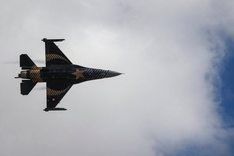 'Solo Turk', an F-16 fighter plane, part of the aerobatic team of the Turkish Air Force, flies over Istanbul's new airport, during the Teknofest aviation, space and technology fair, Thursday, Sept. 20, 2018.