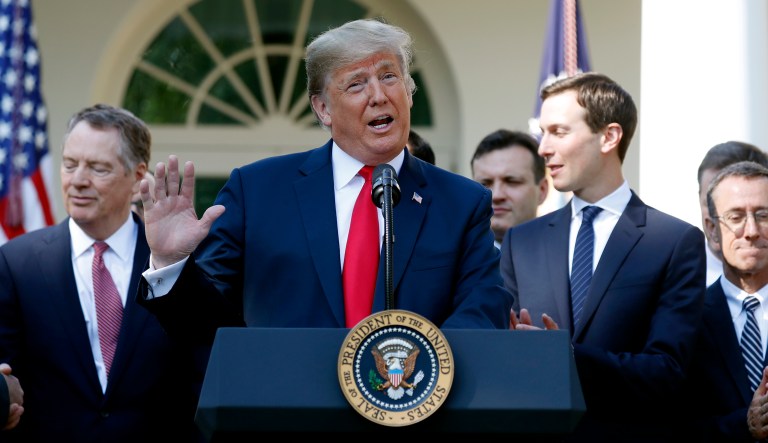 President Trump speaks as he announces a revamped North American free trade deal in the Rose Garden of the White House in Washington, Monday, Oct. 1, 2018.