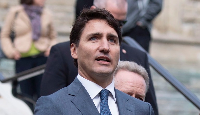 Canadian Prime Minister Justin Trudeau walks to a news conference on the USMCA trade deal on Parliament Hill in Ottawa on Monday, Oct. 1, 2018.
