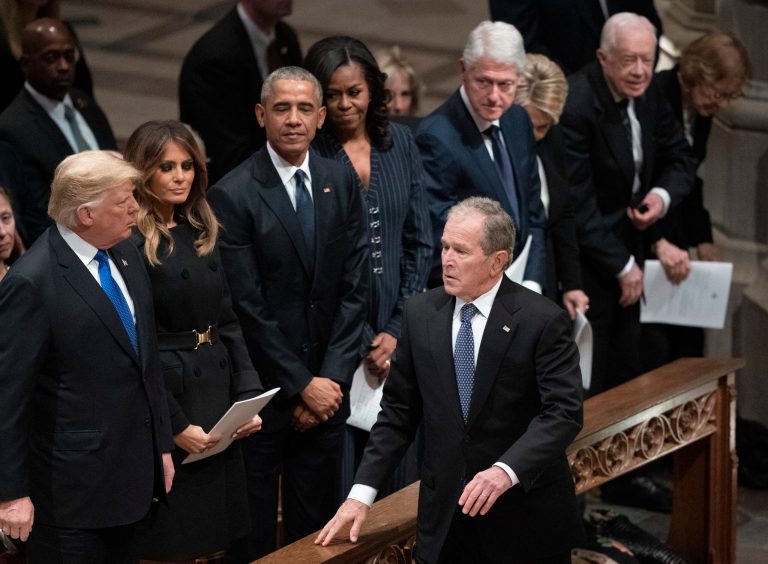 President George W. Bush walks to his seat after greeting President Donald Trump, first lady Melania Trump, former President Barack Obama, Michelle Obama, former President Bill Clinton, former Secretary of State Hillary Clinton, former President Jimmy Carter, and Rosalynn Carter during a State Funeral for former President George H.W. Bush at the National Cathedral, Wednesday, Dec. 5, 2018, in Washington. The late president was the last incumbent to lose reelection.