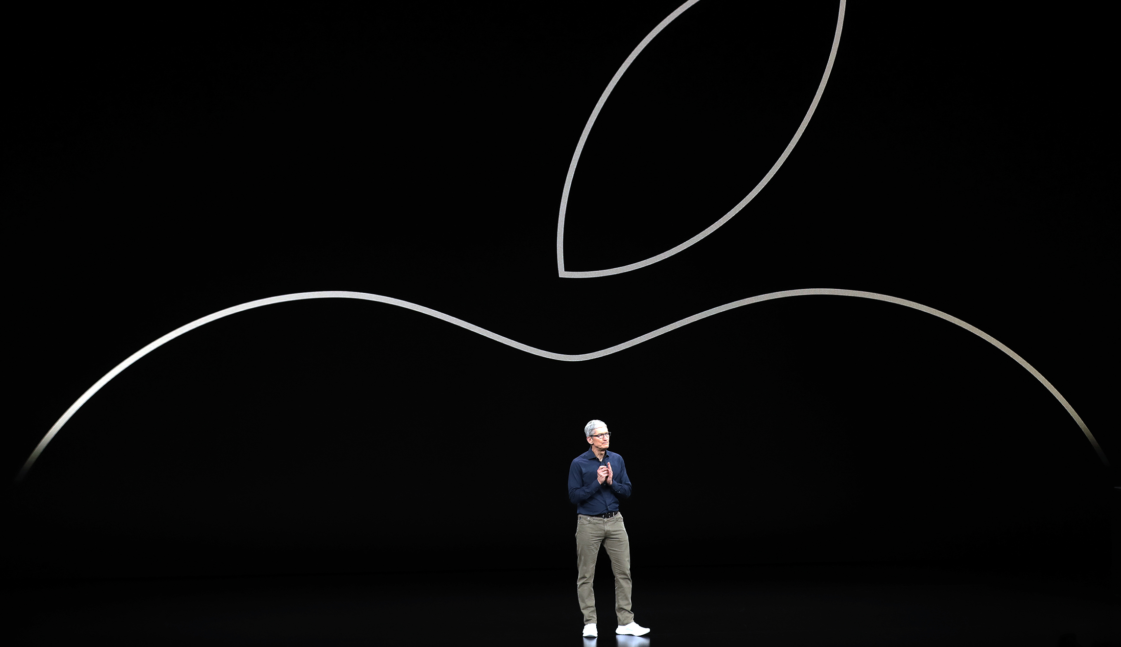 Apple CEO Tim Cook blames trade war with China as he downgrades revenue projections