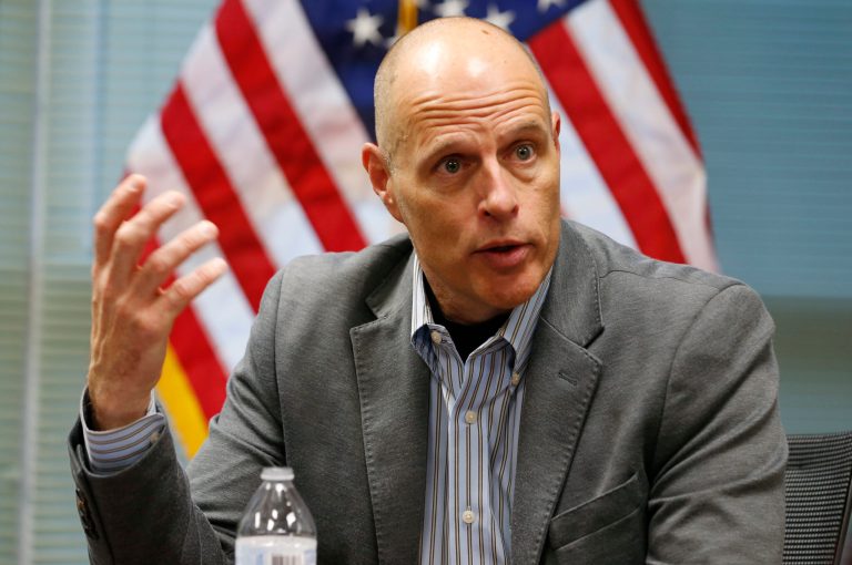 In this Nov. 9, 2018, photo Ronald Vitiello, acting head of U.S. Immigration and Customs Enforcement, gestures during an interview in Richmond, Va. ICE employees have been threatened at their homes, their personal data exposed online, officials said.