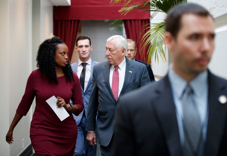 Shuwanza Goff, left, speaks with House Majority Leader Steny Hoyer.