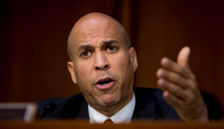 In this Jan. 15, 2019, photo, Sen. Cory Booker, D-N.J., questions Attorney General nominee William Barr as he testifies before a Senate Judiciary Committee hearing on Capitol Hill in Washington. 