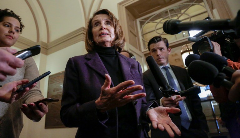 Speaker of the House Nancy Pelosi, D-Calif., takes questions from reporters, Friday, Jan. 18, 2019, on Capitol Hill in Washington.