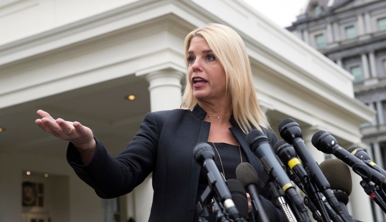 In this Feb. 22, 2018 file photo, after a meeting on student safety with President Trump at the White House, Florida Attorney General Pam Bondi speaks to reporters outside the West Wing about about responses to school shootings like the attack in Parkland, Fla., in Washington. Bondi is heading to Washington, D.C., to take a new post with a leading lobbying firm. Ballard Partners announced Tuesday, Jan. 22, 2019, the well-known Republican politician will head the firmâs new regulatory compliance office. The firm is headed by Brian Ballard, who has close ties to Trump. The news was first reported by Politico.
