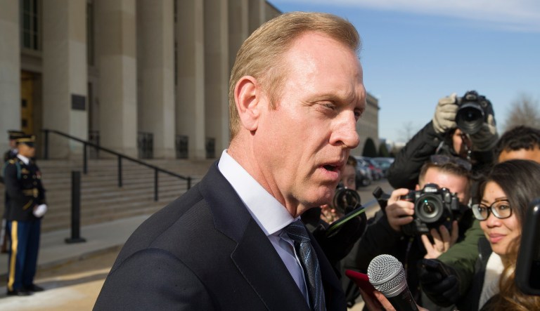 Acting Defense Secretary Patrick Shanahan speaks with the media as he waits for the arrival of NATO Secretary General Jens Stoltenberg at the Pentagon, Monday, Jan. 28, 2019, in Washington. 