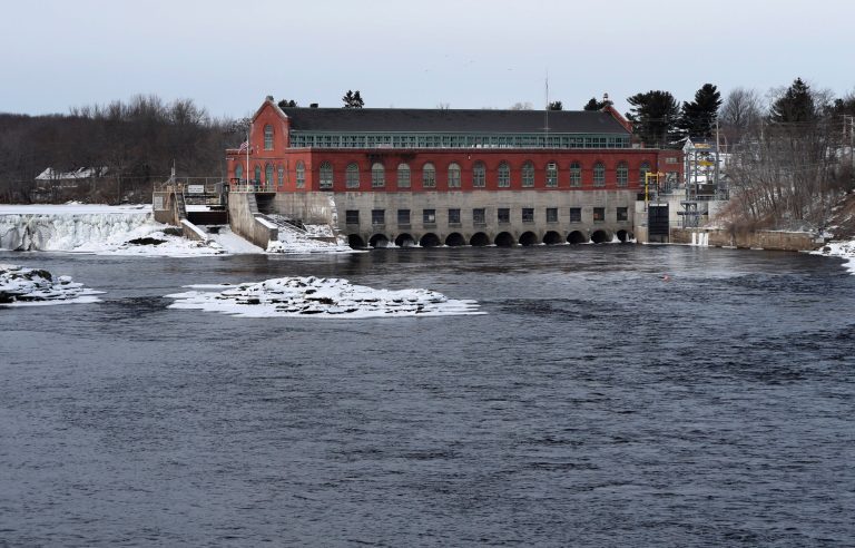 In this Saturday, Jan. 19, 2019 photo, the Brookfield Renewable hydroelectric facility stands at the Milford Dam on the Penobscot River in Milford, Maine. (AP Photo/Robert F. Bukaty)