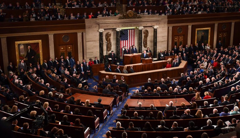 FILE - In this Jan. 30, 2018, file photo, President Donald Trump delivers his State of the Union address to a joint session of Congress on Capitol Hill in Washington. Trump will be surrounded by living reminders of the 2018 election that delivered Democrats the House majority and elected a record number of women.