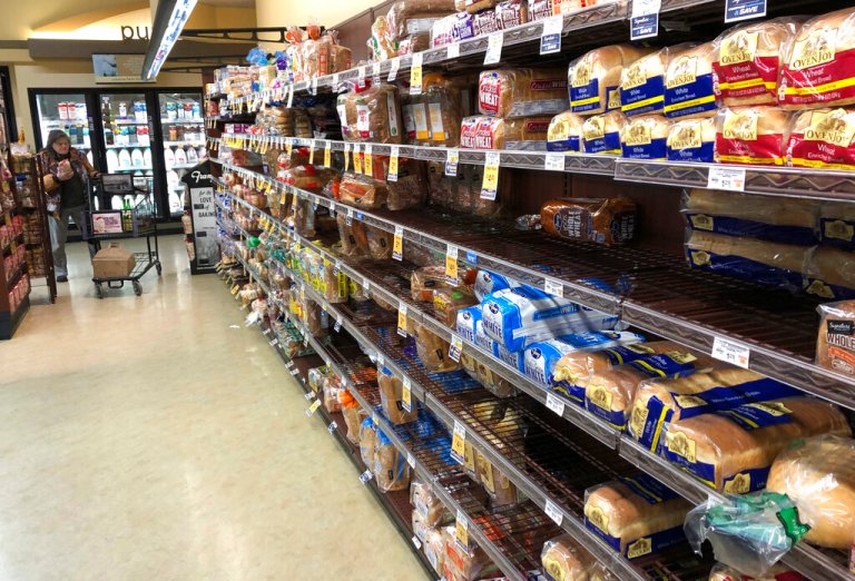 FILE- This Feb. 7, 2019, file photo shows the bread section of a Safeway store in Tacoma, Wash. On Wednesday, Feb. 13, 2019, the Labor Department reports on U.S. consumer prices for January. 