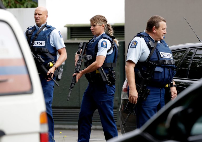 Armed police patrol outside a mosque in central Christchurch, New Zealand.