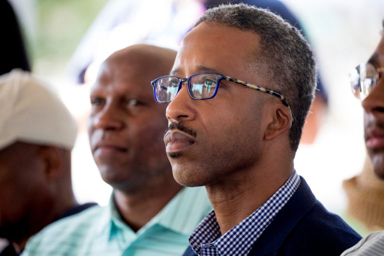 Ward Five Councilmember Kenyan McDuffie attends a news conference where Golden State Warriors guard Stephen Curry announced that he would be sponsoring the creation of men's and women's golf teams at Howard University, Monday, Aug. 19, 2019, at Langston Golf Course in Washington. 