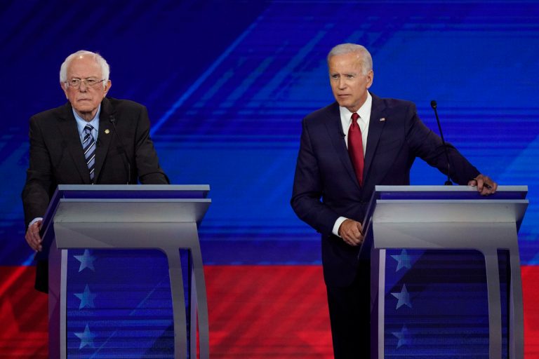 Democratic presidential candidate Sen. Bernie Sanders, I-Vt. , left, and former Vice President Joe Biden listen to a question Thursday, Sept. 12, 2019, during a Democratic presidential primary debate hosted by ABC at Texas Southern University in Houston.