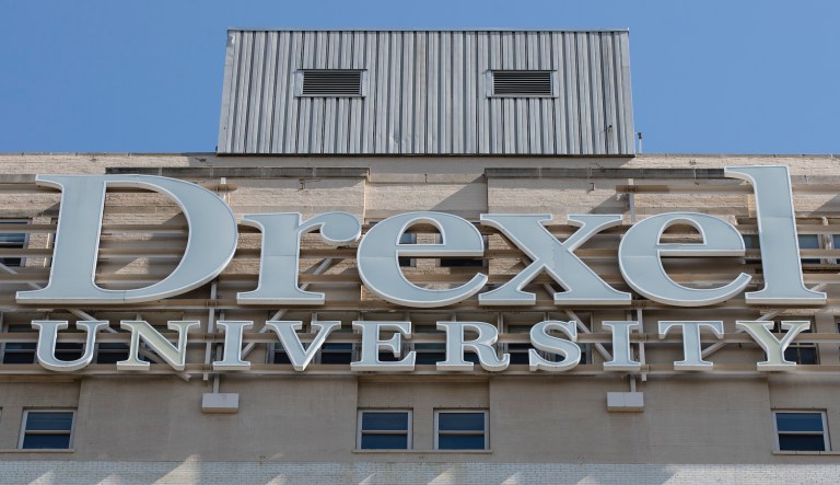 Professor charged with theft after spending $96,000 in federal grants on strippers