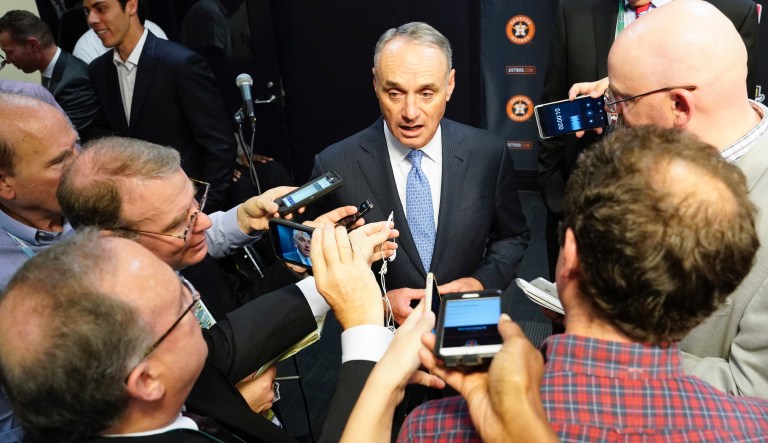 MLB commissioner Robert D. Manfred Jr. talks to the media before Game 2 of the baseball World Series between the Houston Astros and the Washington Nationals Wednesday, Oct. 23, 2019, in Houston.