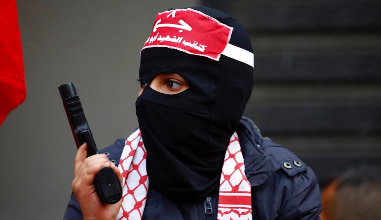 Palestinians participate in a rally marking the 52nd anniversary of the leftist Popular Front for the Liberation of Palestine (PFLP), in Gaza City, Saturday, Dec. 7, 2019. Founded in 1967, the PFLP is a Marxist-Leninist, nationalist, political and militant organization.