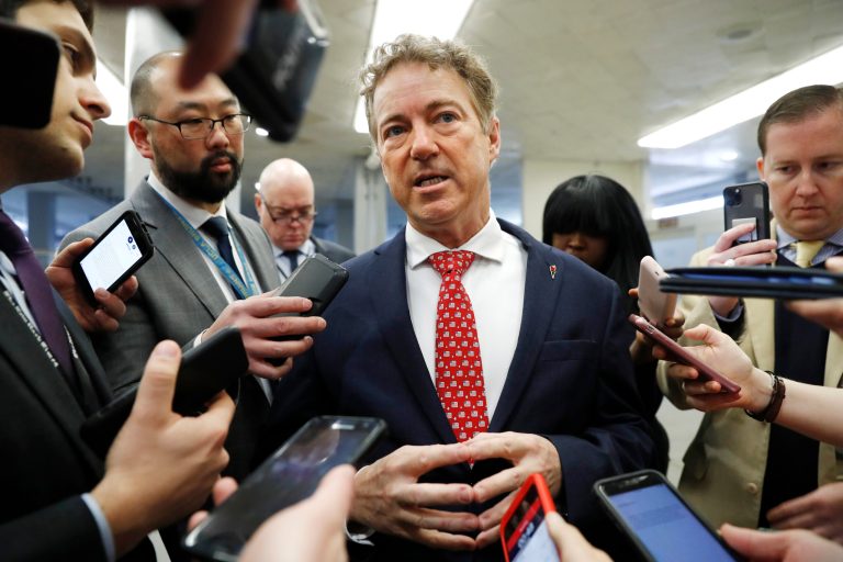 Sen. Rand Paul, R-Ky., talks to reporters before attending the impeachment trial of President Donald Trump on charges of abuse of power and obstruction of Congress, Wednesday.