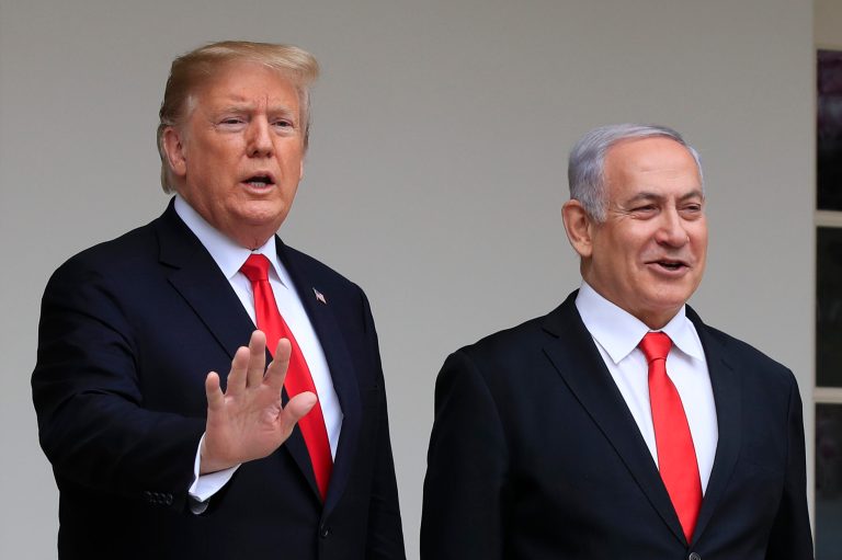In this March 25, 2019, file photo, President Donald Trump welcomes visiting Israeli Prime Minister Benjamin Netanyahu to the White House in Washington. A blueprint the White House is rolling out to resolve the decades-long conflict between the Israelis and Palestinians is as much about politics as it is about peace. President Donald Trump said he would likely release his long-awaited Mideast peace plan a little before he meets Tuesday with Israeli Prime Minister Benjamin Netanyahu and his main political rival Benny Gantz.