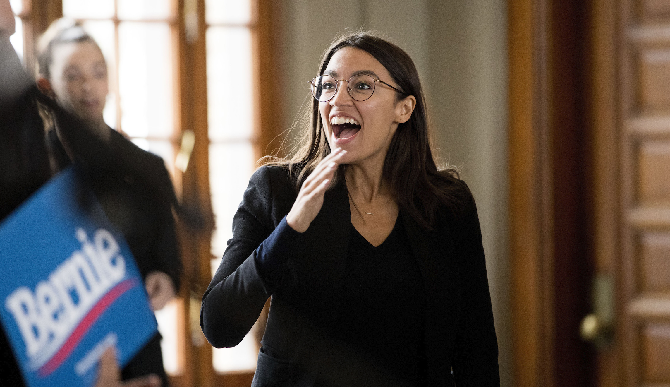 AOC jabs Michael Bloomberg over campaign lawsuits after Bernie Sanders vows to provide healthcare for staff