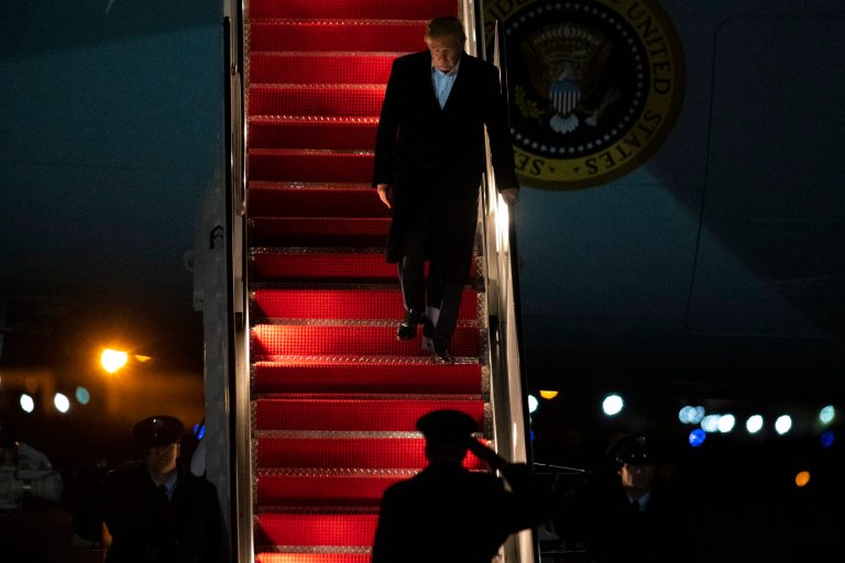 President Donald Trump exits Air Force One, early Friday, Jan. 31, 2020, following trips to Michigan and Iowa, at Andrews Air Force Base, Md.
