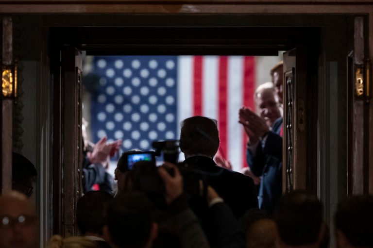 President Donald Trump enters the House Tuesday night to give his State of the Union address, during which he highlighted the economic boom of the past three years.