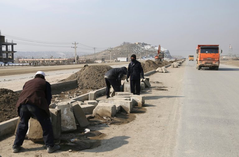 Afghan laborers work on a bridge project funded by the government, in Kabul, Afghanistan. Rebuilding war-ravaged Afghanistan has cost thousands of lives according to a new report from the U.S. government watchdog that monitors the billions of U.S. dollars spent reconstructing Afghanistan. 