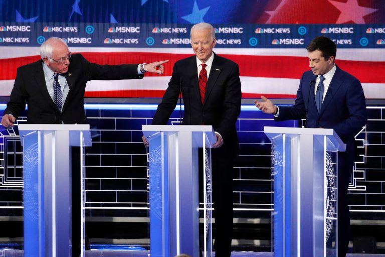 Democratic presidential candidate Sen. Bernie Sanders, points at former Vice President Joe Biden, and former South Bend Mayor Pete Buttigieg, right, during a Democratic presidential primary debate Wednesday in Las Vegas.