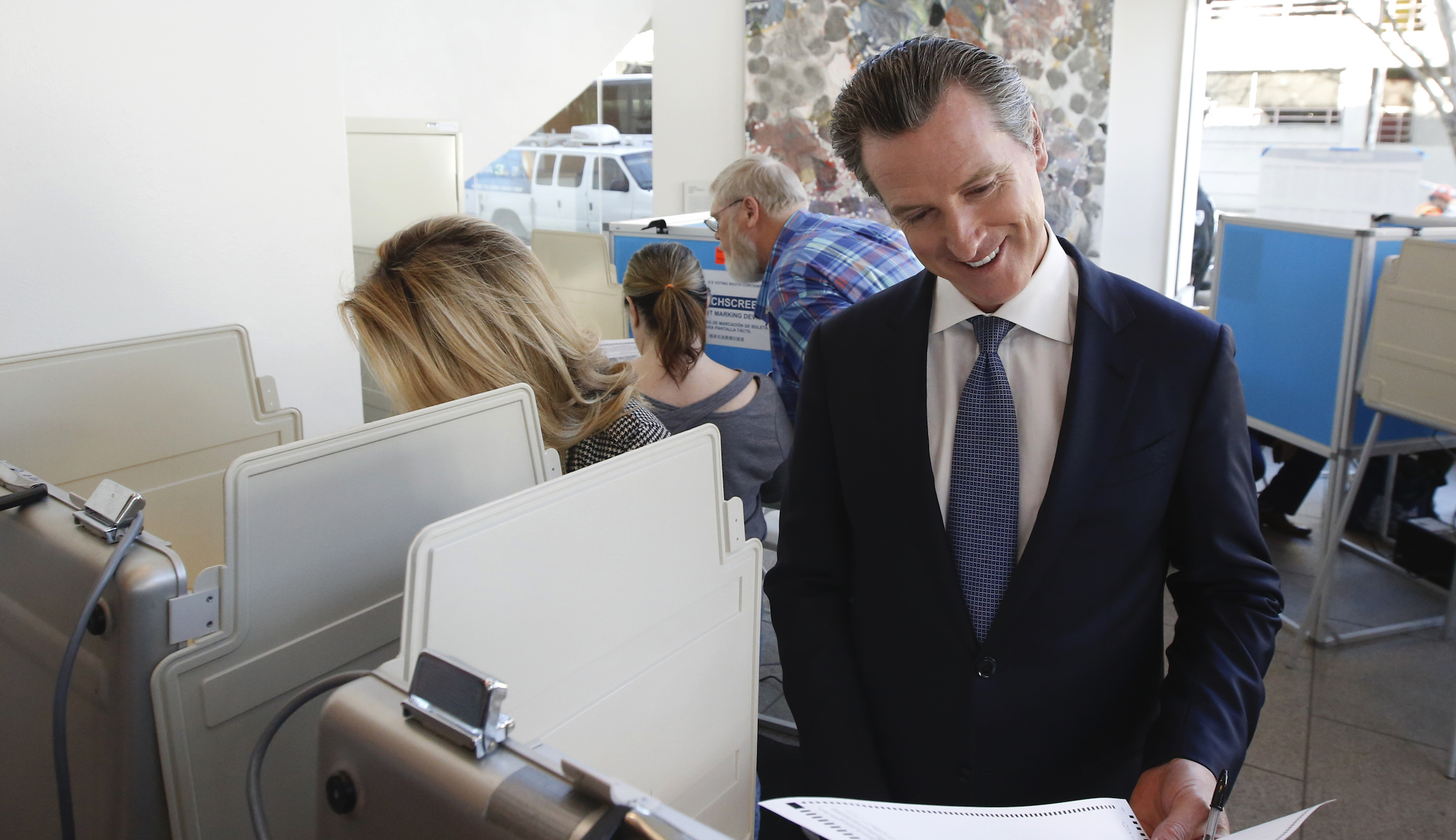 Voters in 15 California counties issued provisional ballots as precincts struggle to access voter database