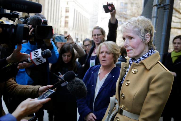 E. Jean Carroll, right, talks to reporters outside a courthouse in New York, Wednesday, March 4, 2020.