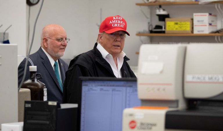 President Trump and Robert Redfield during a visit to the Centers for Disease Control and Prevention, Atlanta, in March.