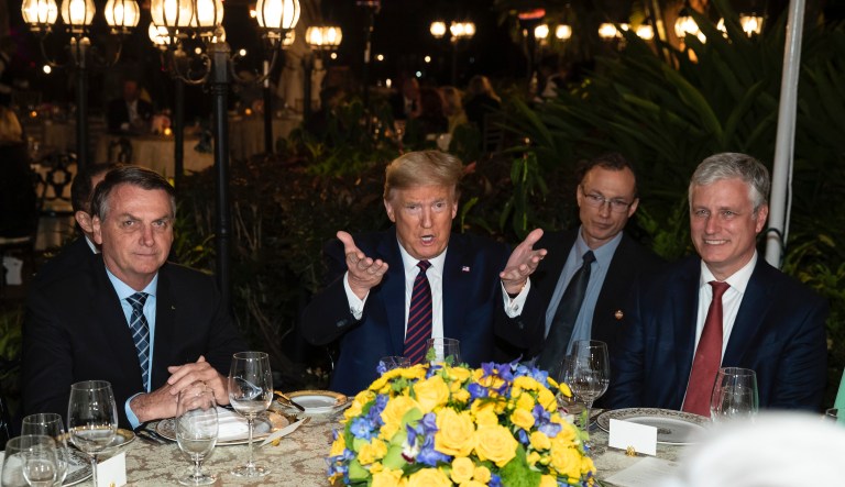 Brazilian official photographed with Trump and Pence days ago tests positive for coronavirus